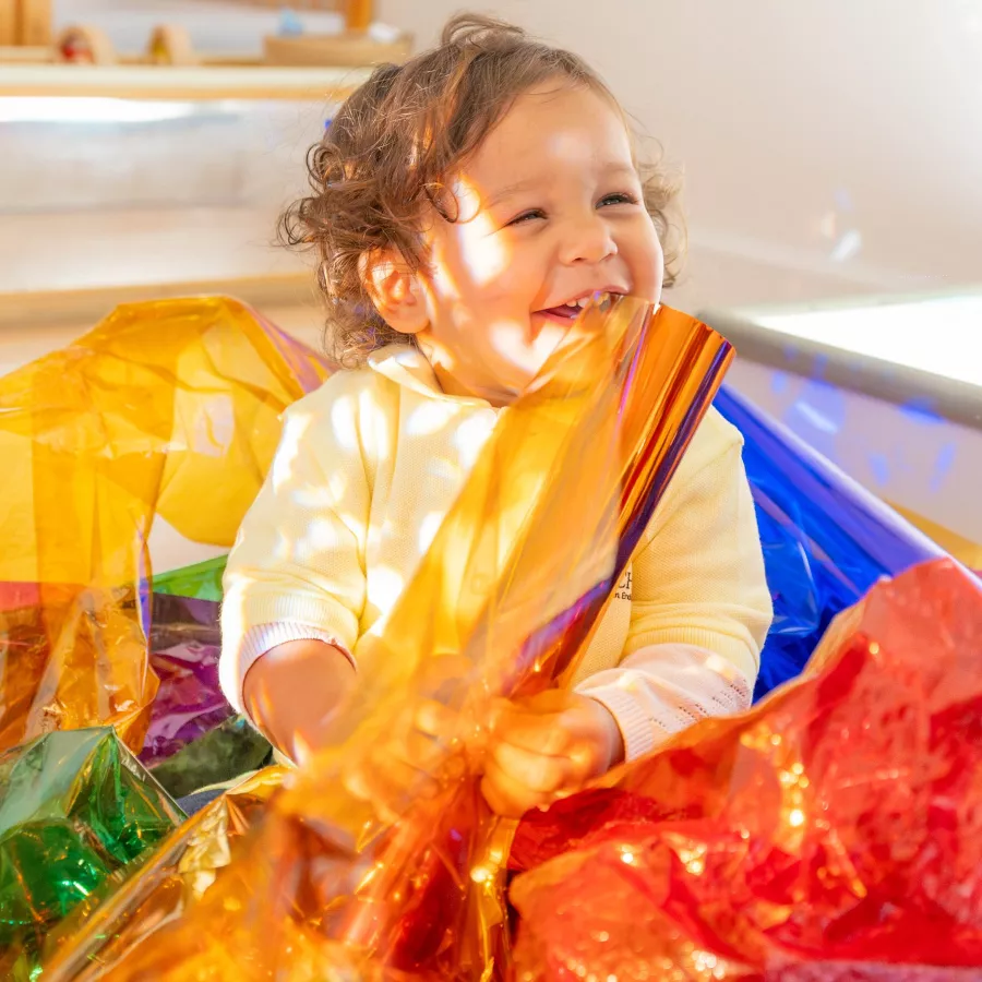 child playing and learning in our preschool