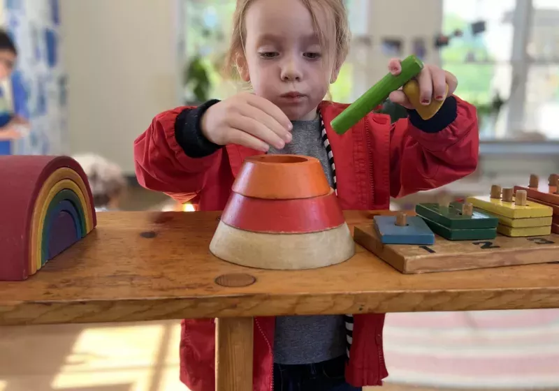 Girl playing in classroom